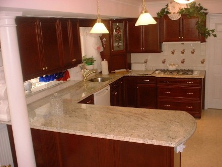 Cherry Vienna HomeCrest cabinets and granite Colonial